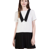 Vestido Corto con Blusa Blanca, Cuello Negro en V y Falda Tableada - Blanco y Negro
